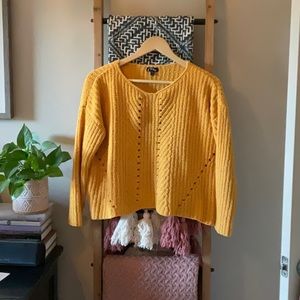 Super cute yellow sweater!